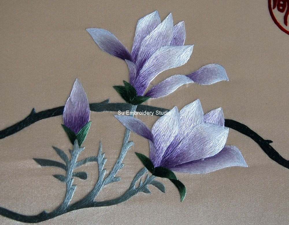 closeup of purple magnolia chinese silk embroidery