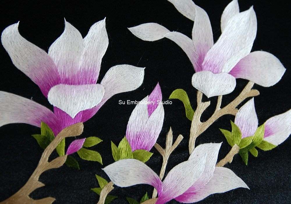 closeup of purple magnolia chinese silk embroidery