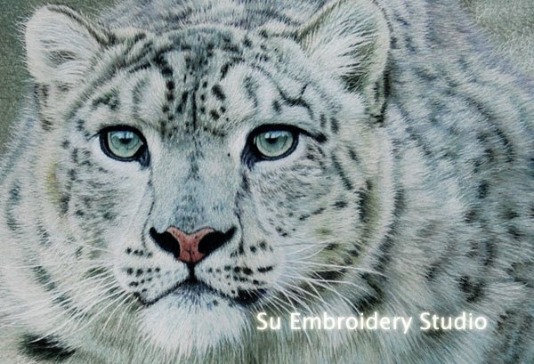 closeup of masterpiece silk embroidery 'snow leopard'