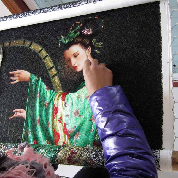 Chinese Embroidery Artist at SES Embroidering a Silk Embroidery of Lady Playing the Harp based on an Oil Painting