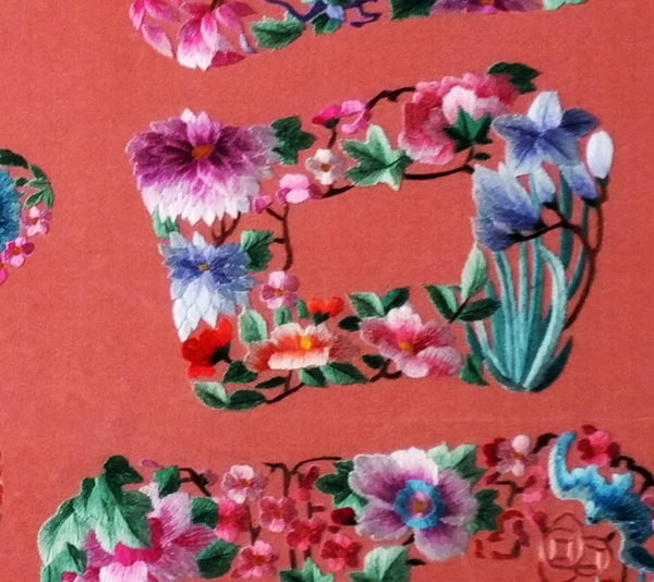 closeup of silk embroidery word 'fu'