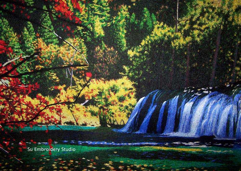 closeup of jiuzhaigou waterfall, hand embroidered with silk threads