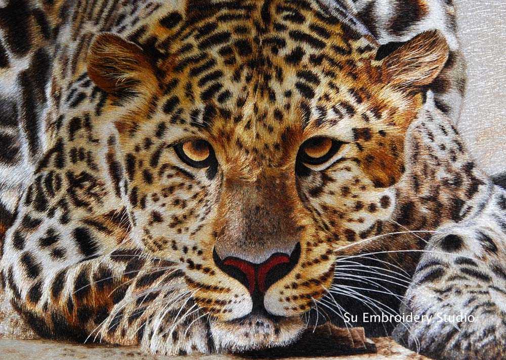 silk embroidery 'leopard in crouch' closeup