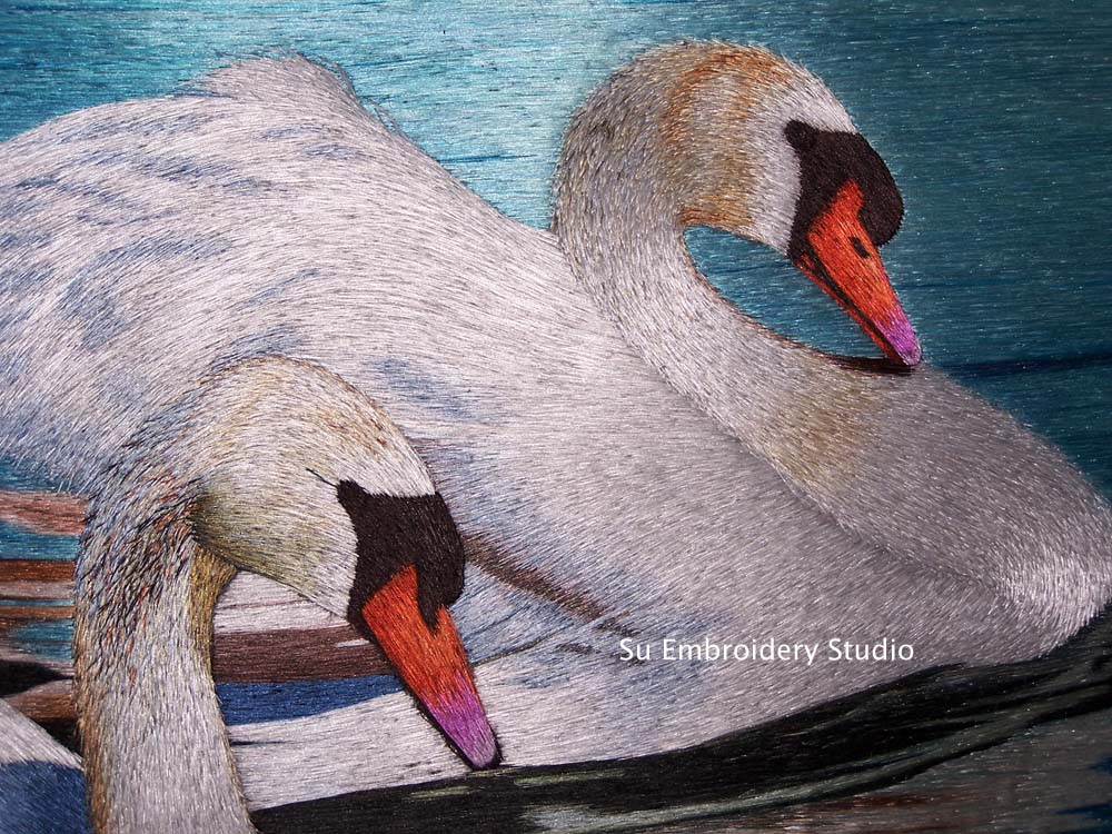 closeup of chinese silk embroidery swans