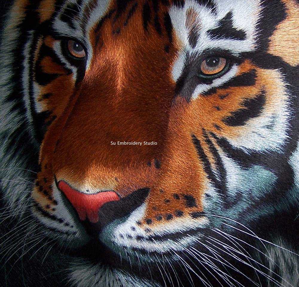 closeup of chinese silk embroider tiger head