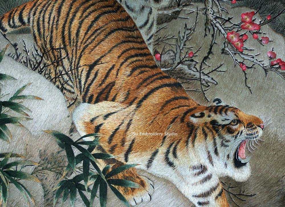 closeup of chinese silk embroidery 'two tigers'