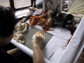 suzhou embroidery artist working at suzhou embroidery research institute