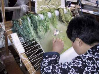 suzhou embroidery artist working at suzhou embroidery research institute