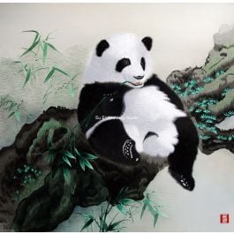 panda sitting on a rock eating bamboo, chinese handmade silk embroidery